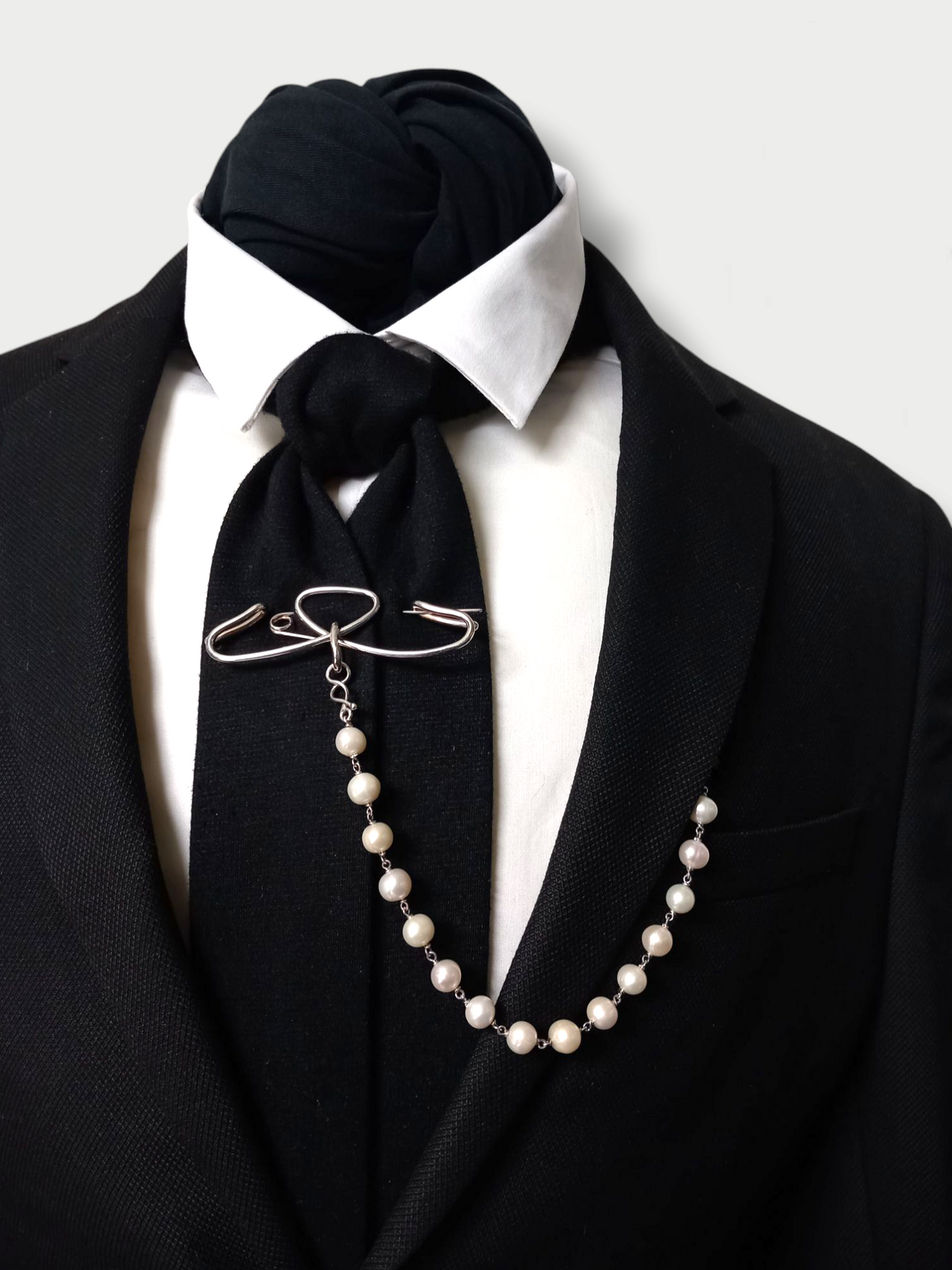 art deco' inspired silver (925) statement pin styled on a tie and blazer outfit